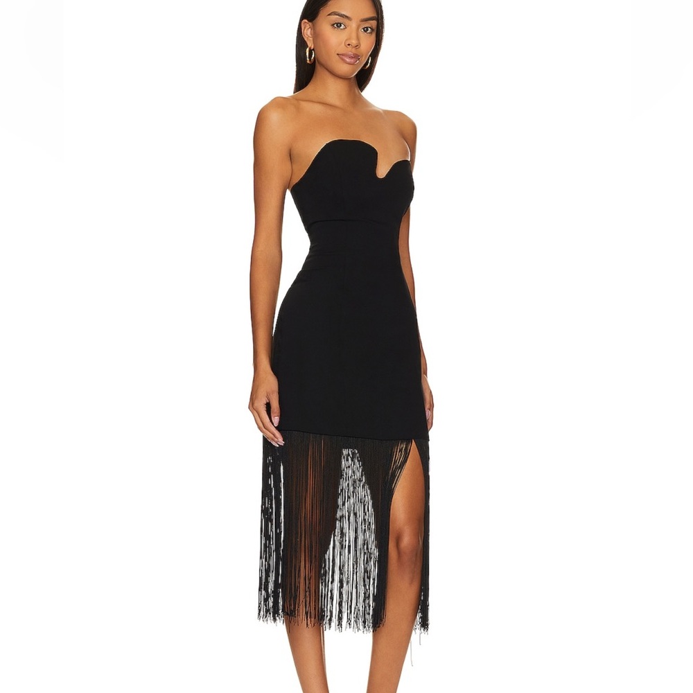 Amanda Uprichard puzzle piece dress with fringe.